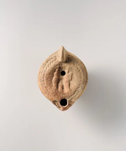 Terracotta oil lamp