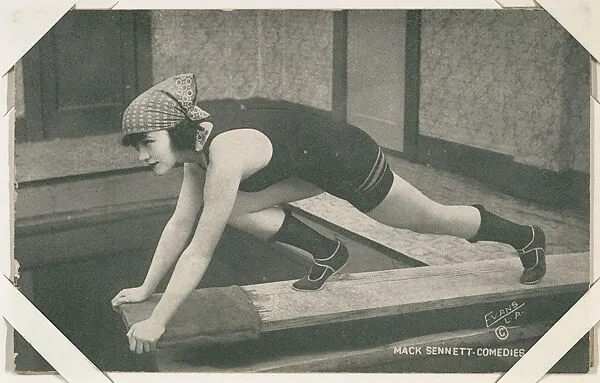 Bathing beauty posed on diving board from Mack Sennett Comedies Arcade series (W423) — Unknown