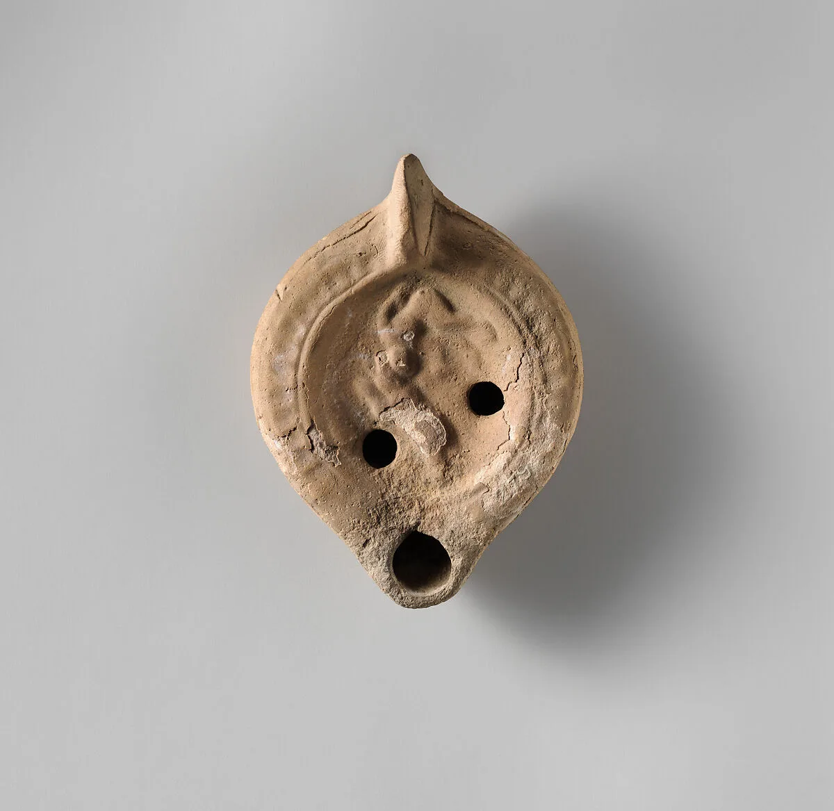 Terracotta oil lamp — Unknown