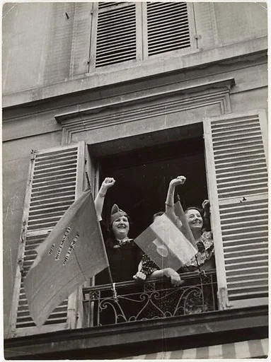 [Women Giving Popular Front Salute from Window, Bastille Day, Paris]