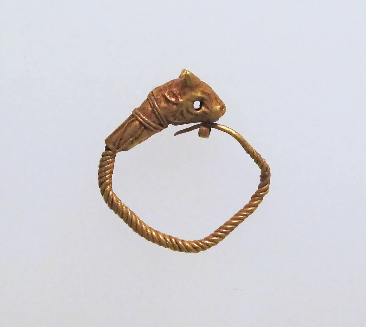 Gold earring with head of a bull — Unknown