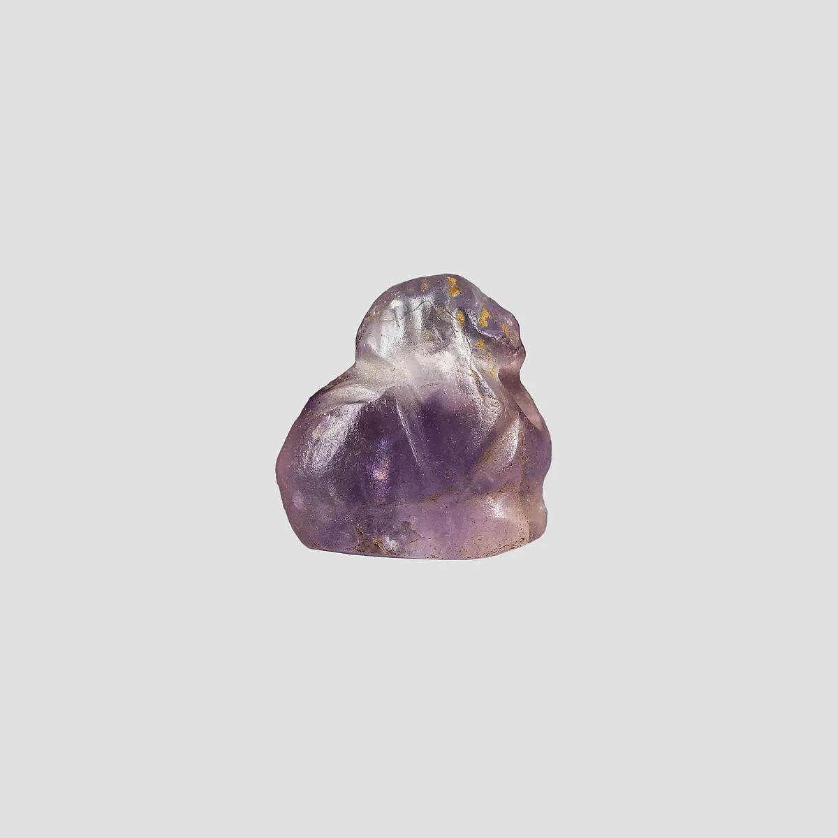 Human headed amulet (bird?) — Unknown