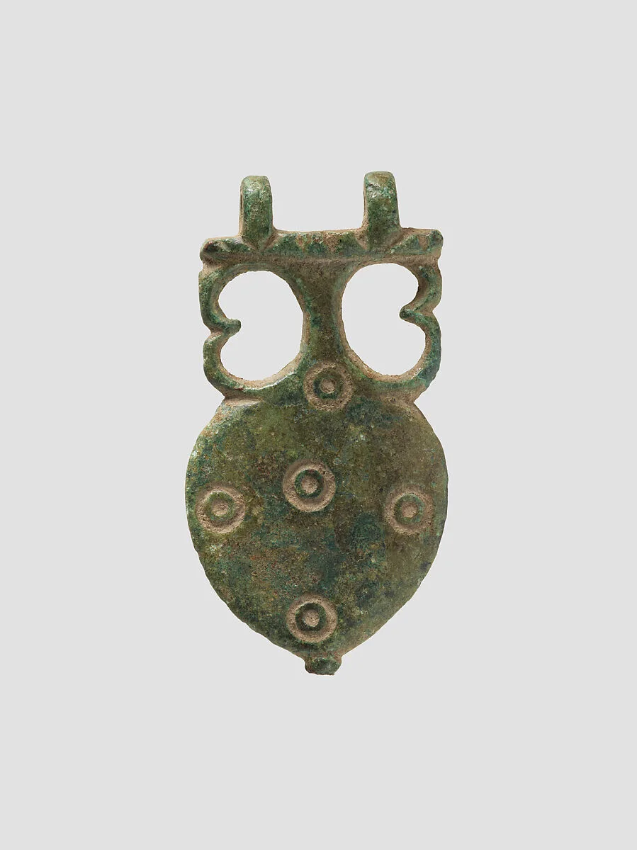 Belt buckle or pendant — Unknown