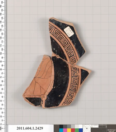 Terracotta fragment of a kylix (drinking cup)