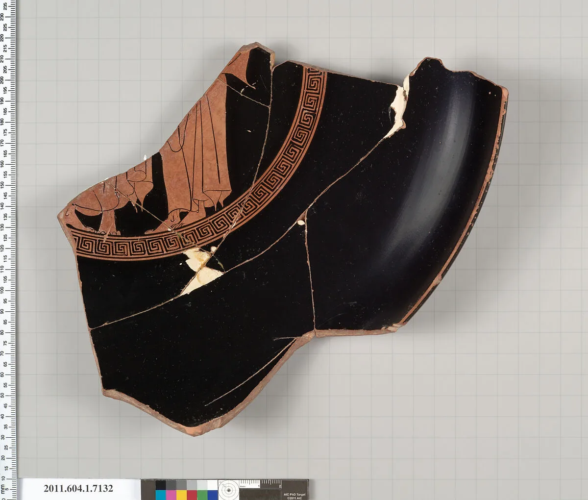 Terracotta fragment of a kylix (drinking cup) — Makron