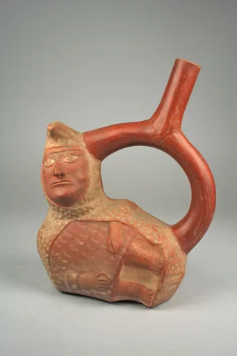 Stirrup Spout Bottle with Peanut Figure