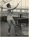 [Male Model Posed Pulling a Rope in Anna Huntington's Rooftop Studio]