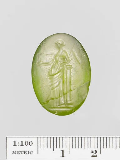 Green glass oval engraved on both sides