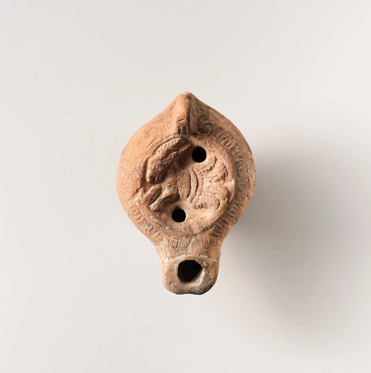 Terracotta oil lamp — Unknown
