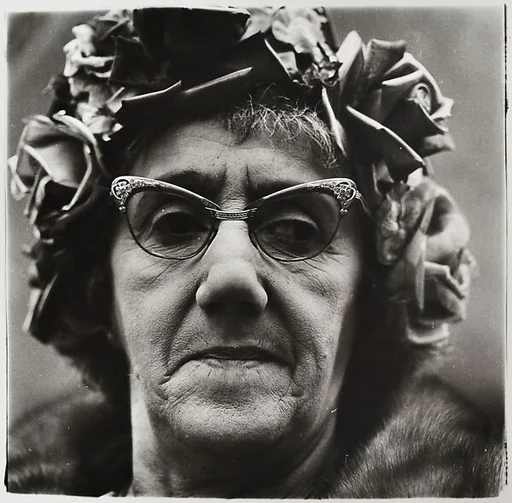 Woman in a rose hat, N.Y.C.
