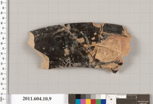 Terracotta fragment of a kylix (drinking cup)