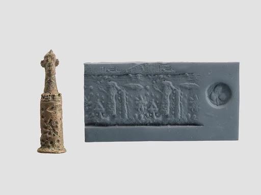 Stamp-cylinder seal with cultic scene, surmounted by (a plaster copy?) double-faced Pazuzu head 