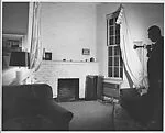 [Living Room Interior with Unidentified Man, Possibly Ben Schultz or Dan Weiner, 441 East 92nd Street, New York]