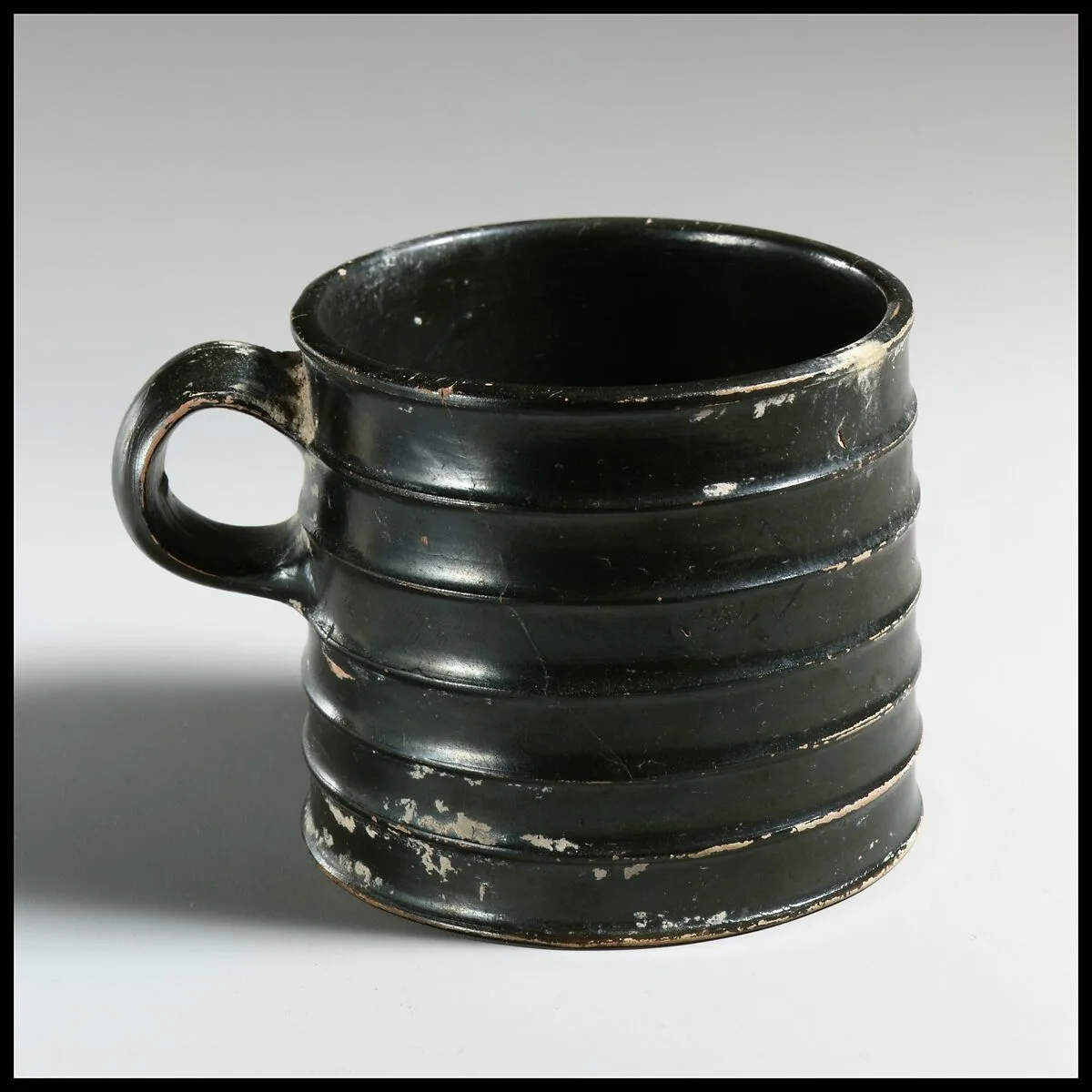Terracotta mug with horizontal rills — Unknown