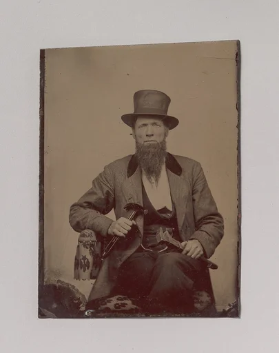 [Man in Top Hat Holding a Hammer and Wrench]
