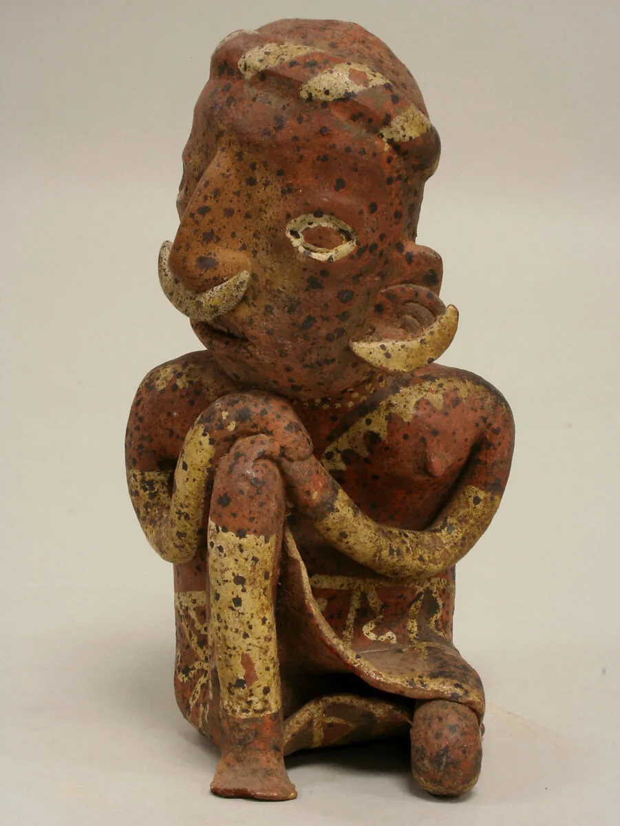 Seated Female Figure — Unknown