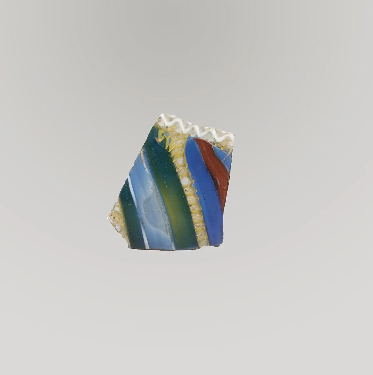Glass striped mosaic bowl fragment — Unknown