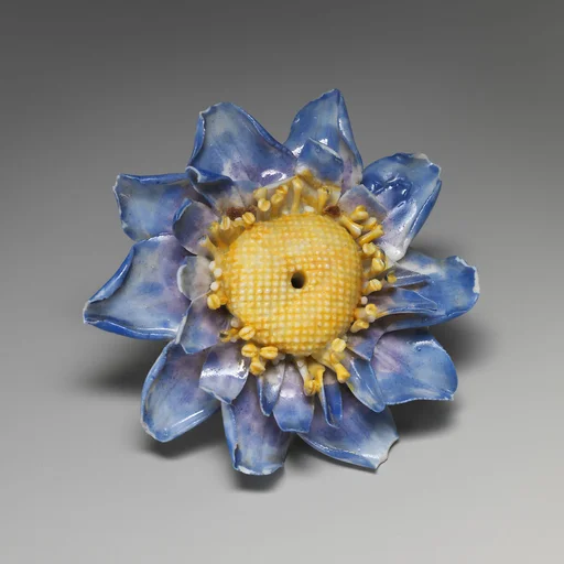 Porcelain flower (one of a set of nine)