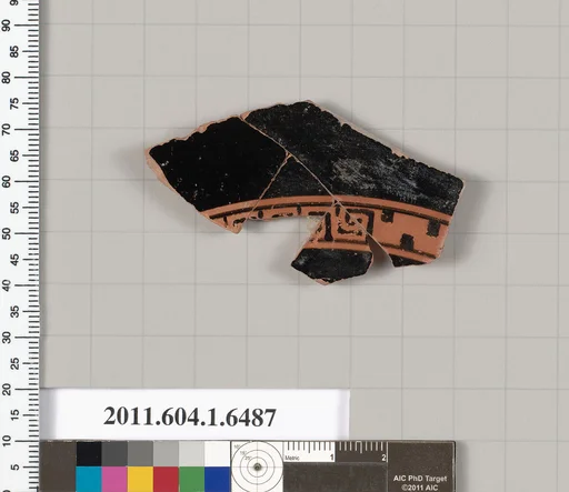 Terracotta fragment of a kylix (drinking cup)