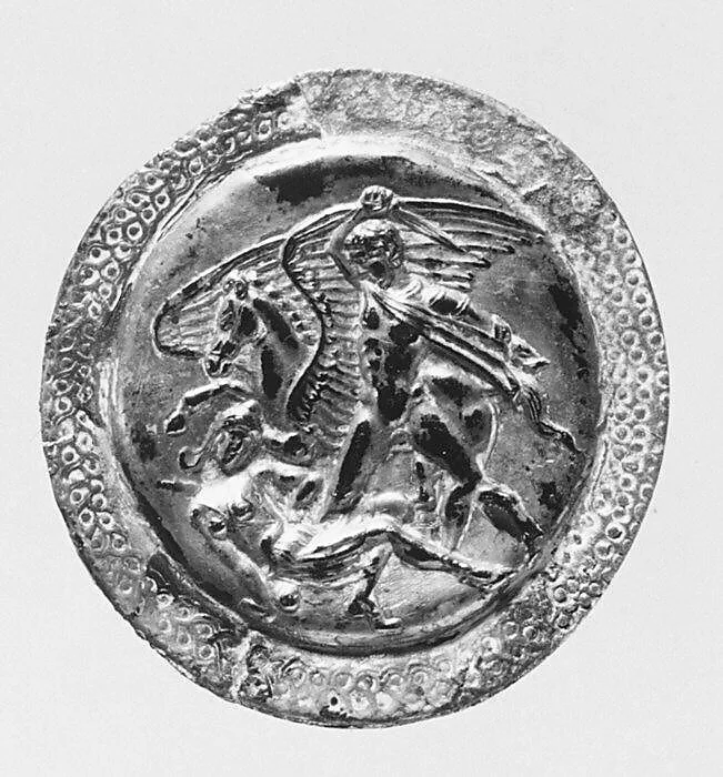 Two silver roundels — Unknown