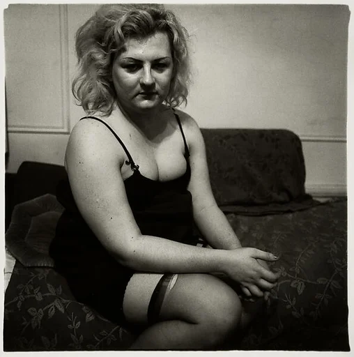 Transvestite with a torn stocking, N.Y.C.