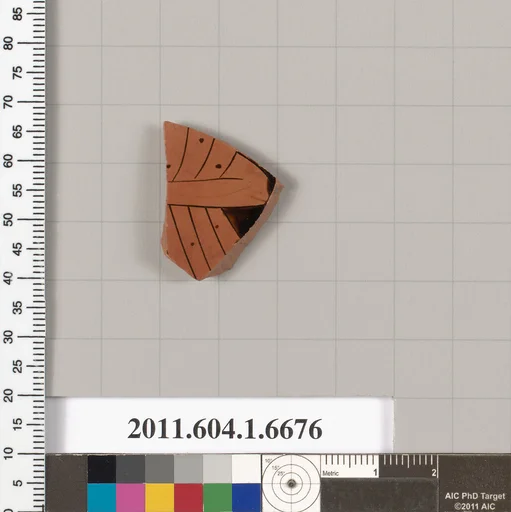 Terracotta fragment of a kylix (drinking cup)