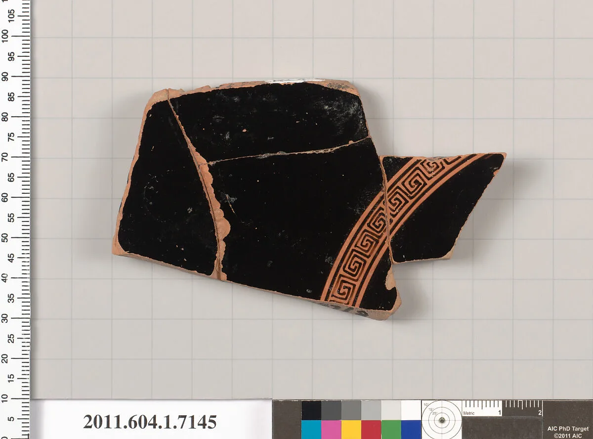 Terracotta fragment of a kylix (drinking cup) — Makron
