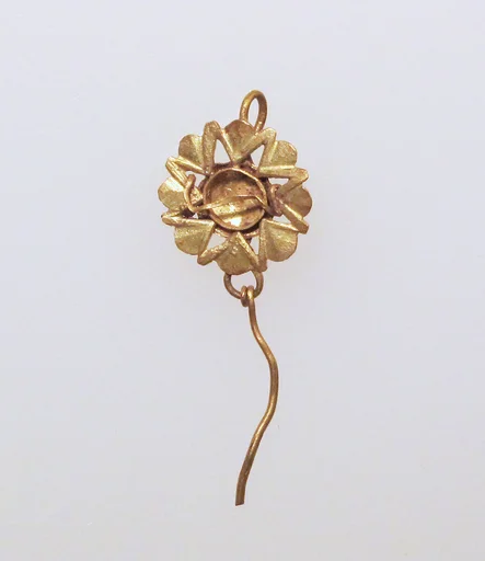Earring with pendant and perforated disc