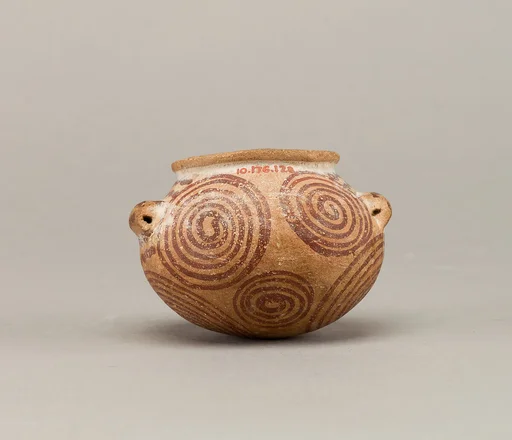 Squat decorated ware jar depicting spirals