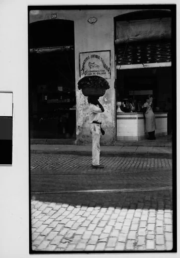 [Vendor with Basket on Head on Street, Havana, Cuba]