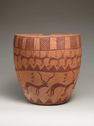 Deep bowl depicting people, animals, and plants