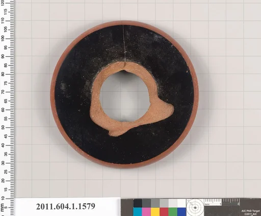Terracotta fragment of a kylix (drinking cup)