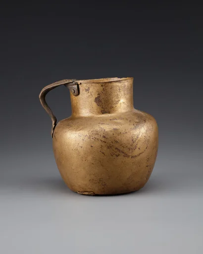 Jug with lotus handle