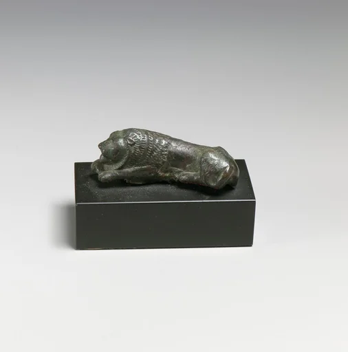 Bronze statuette of a recumbent lion