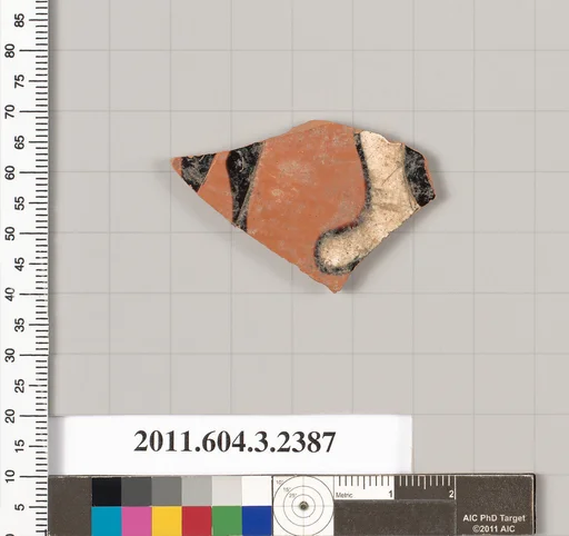 Terracotta fragment of a kylix: eye-cup (drinking cup)