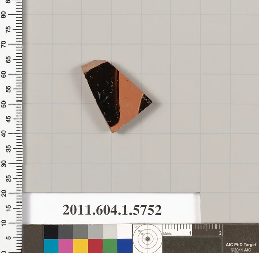 Terracotta fragment of a kylix: eye-cup (drinking cup)