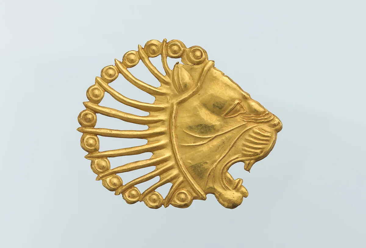 Applique in the shape of a lion's head — Unknown