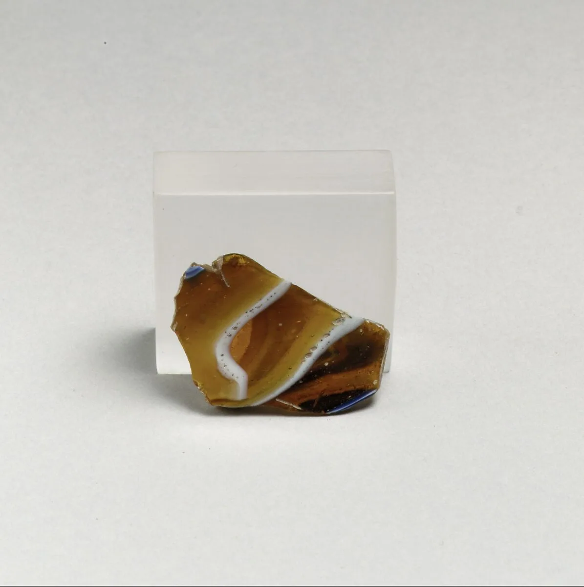 Glass mosaic ribbed bowl fragment — Unknown