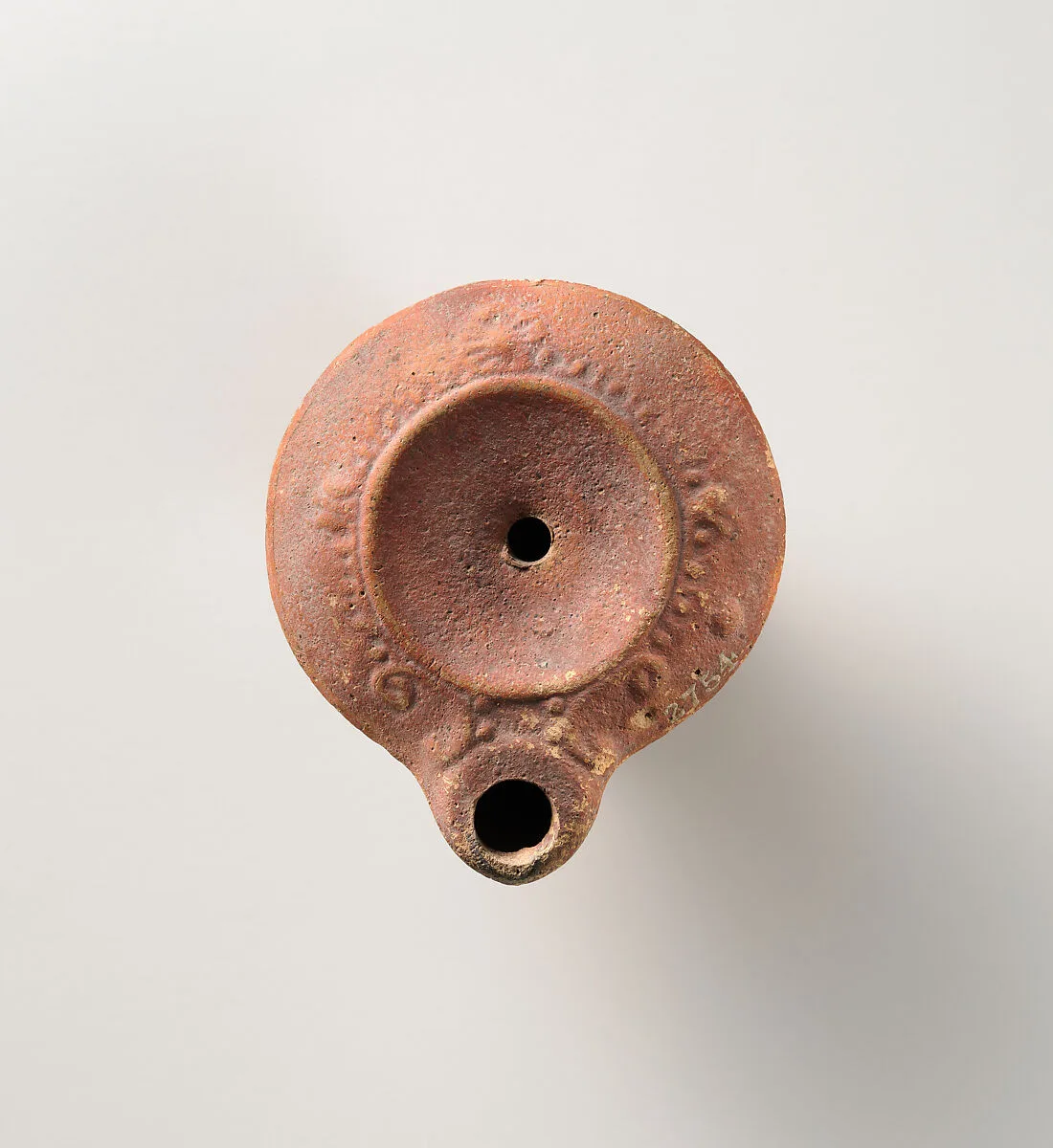 Terracotta oil lamp — Unknown