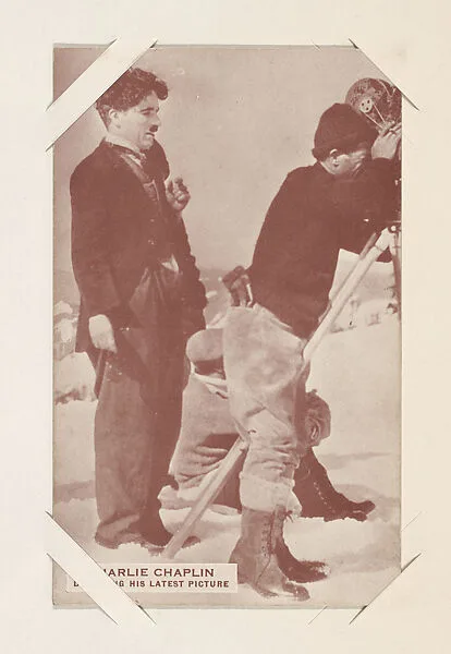 Charlie Chaplin directing his latest picture from Movie Stars Exhibit Cards series (W401) — Unknown