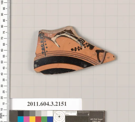 Terracotta fragment of a kylix (drinking cup)