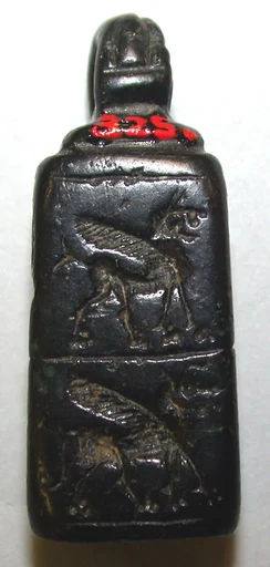 Stamp seal (cubical with loop handle) with monsters and anthropomorphic figure