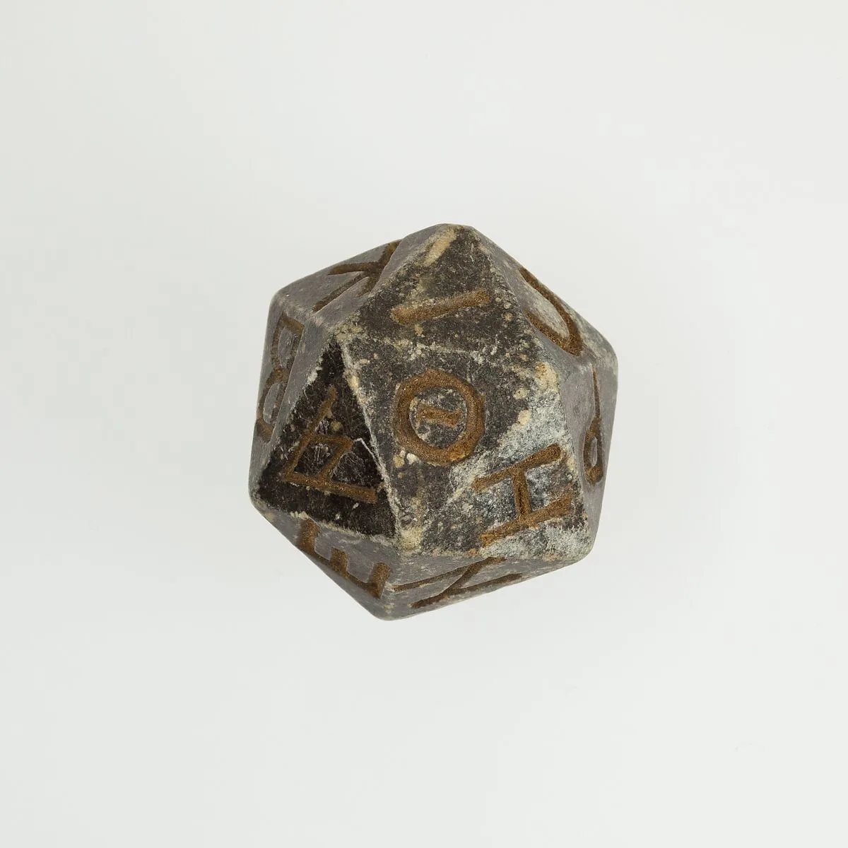 Twenty-sided die (icosahedron) with faces inscribed with Greek letters — Unknown