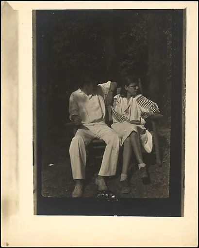[Paul and Dorothy Grotz Seated Outdoors on Wooden Bench, Probably Darien, Connecticut]