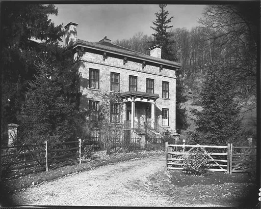 [Greek Revival House with Cresting Over Entry Porch and Roofline, Somers, New York]