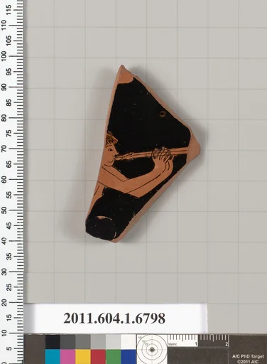 Terracotta fragment of a kylix (drinking cup)