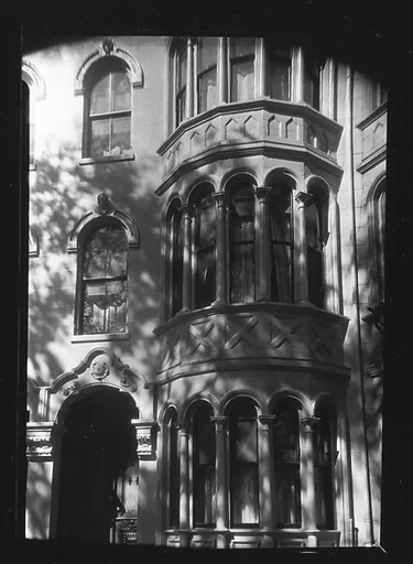 [Detail of Doorway and Two-Story Bay Windows of Italianate Revival Town House, South End, Boston, Massachusetts]