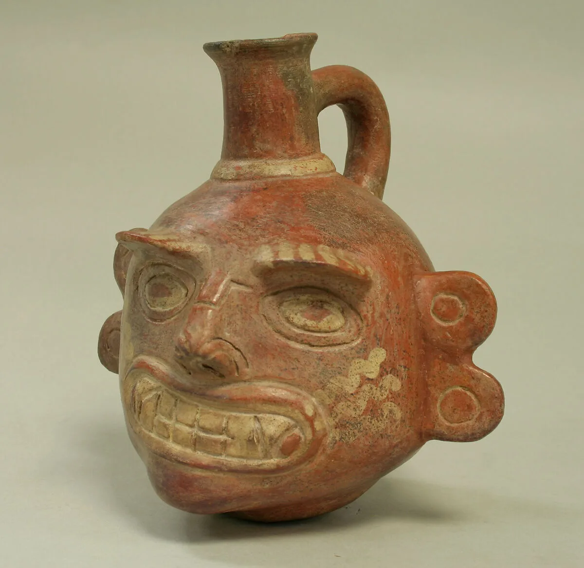 Single Spout Bottle with Fanged Face — Unknown
