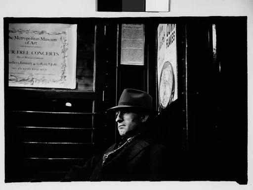 [Five 35mm Film Frames: Subway Passengers, New York City: Man Wearing Hat and Overcoat, Woman in Hat, Man Reading Newspaper, Subway Bookstall?]