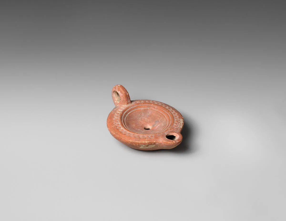 Terracotta oil lamp — Unknown